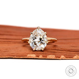 Front view fat pear lab grown diamond ring with vintage crown prongs