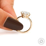 Close-up side angle highlighting vintage crown prongs and diamond depth