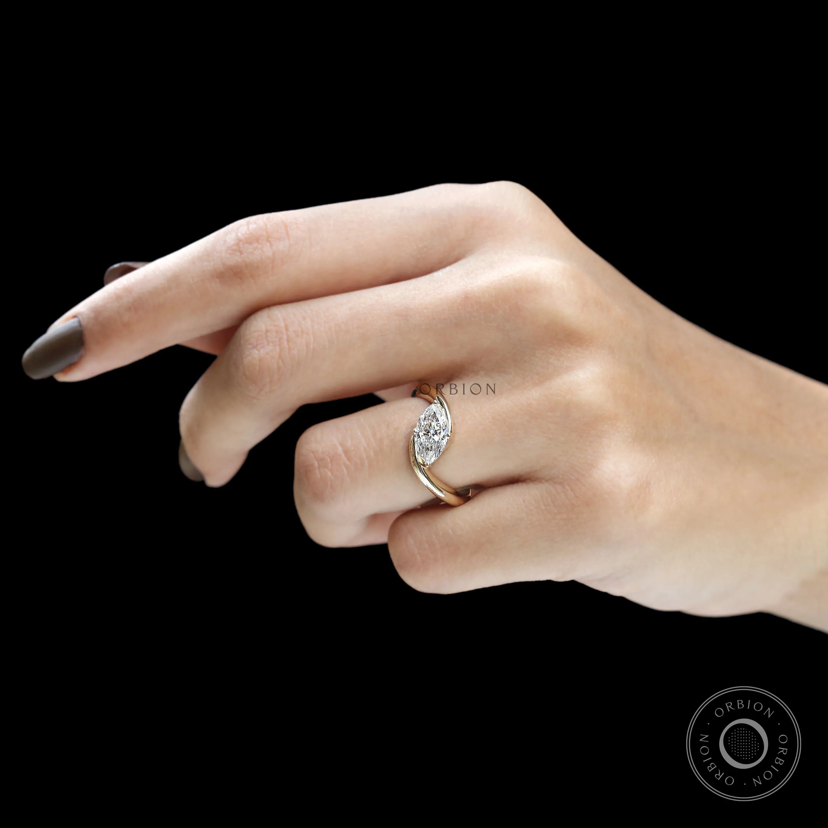 Yellow gold marquise solitaire ring available in lab diamond or moissanite