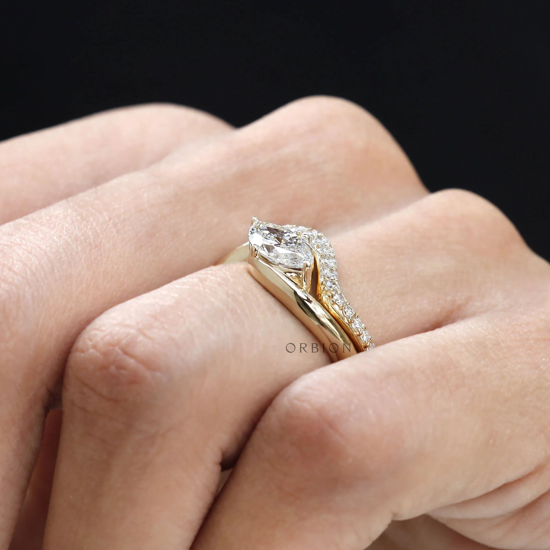 Curved band marquise wave style bridal set in 14K yellow gold