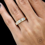 10k gold matte finish station diamond band flat lay 