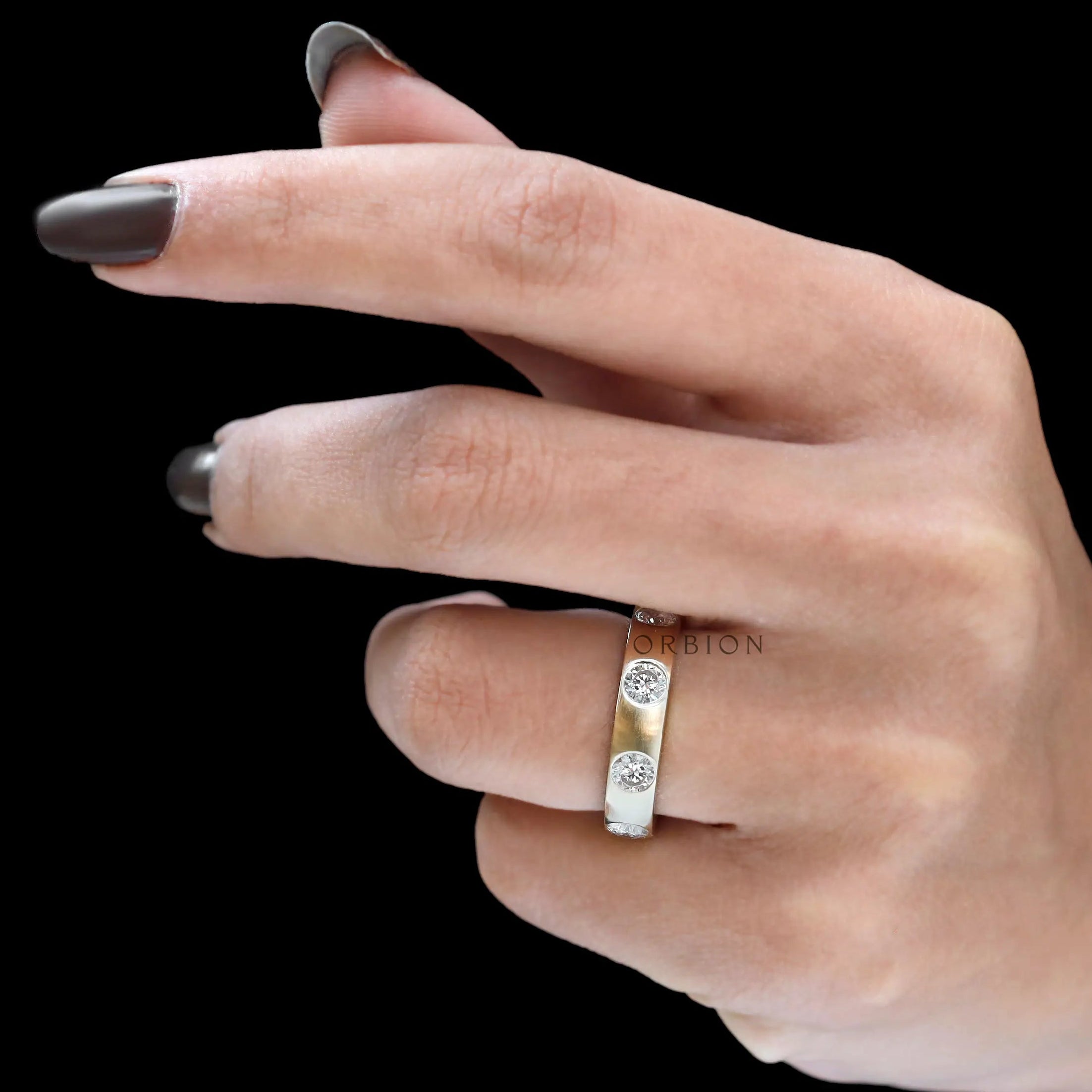 10k yellow gold matte finish wide diamond band on hand