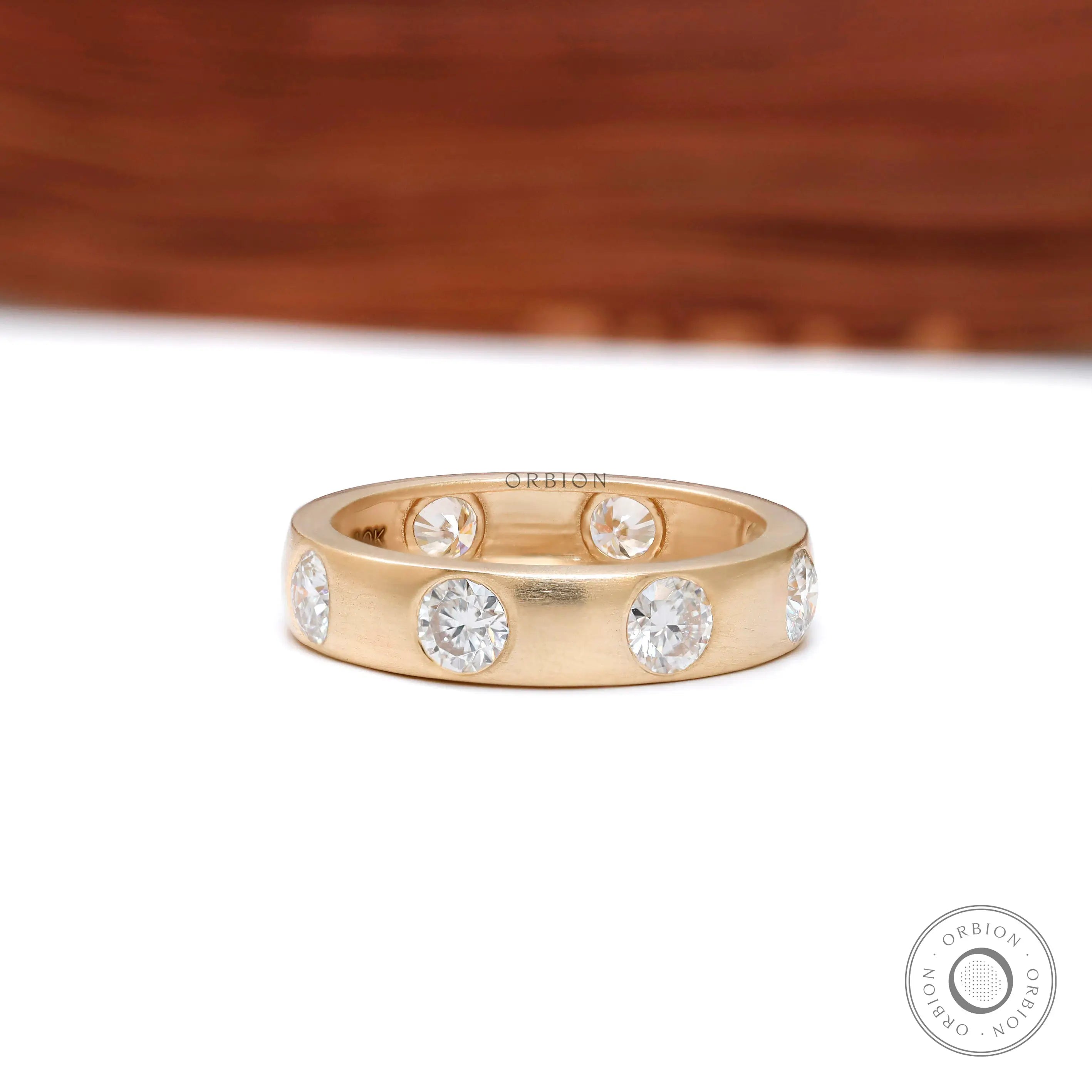 Flush set station style round lab diamond full eternity wedding band in 10k yellow gold 