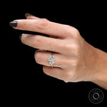 Pear cut lab diamond Toi et Moi ring elegant hand pose
