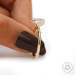 Minimal yellow gold band with pear cut diamonds