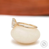 Modern pear cut two stone engagement ring glossy band