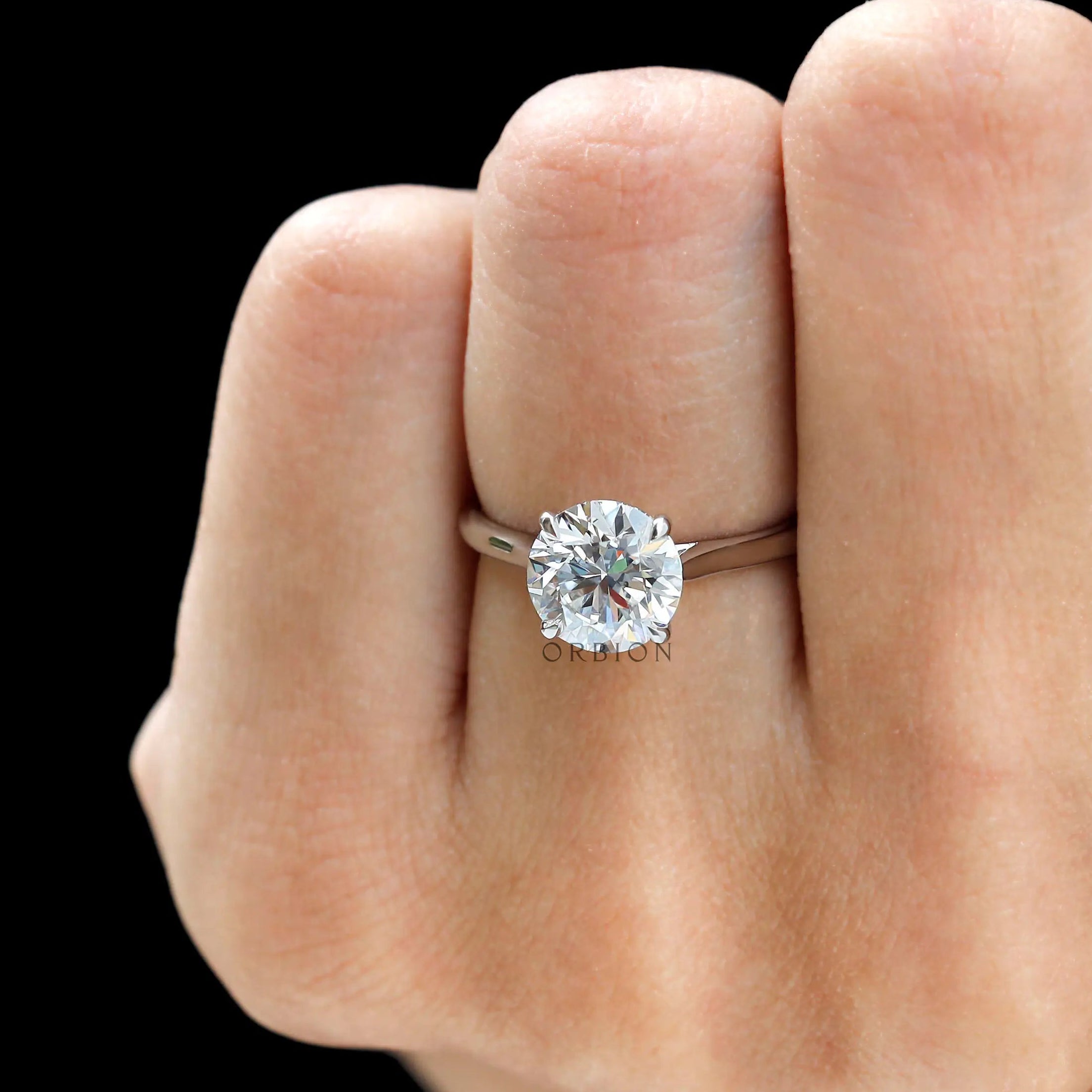 2 CT round cathedral ring white gold finger shot