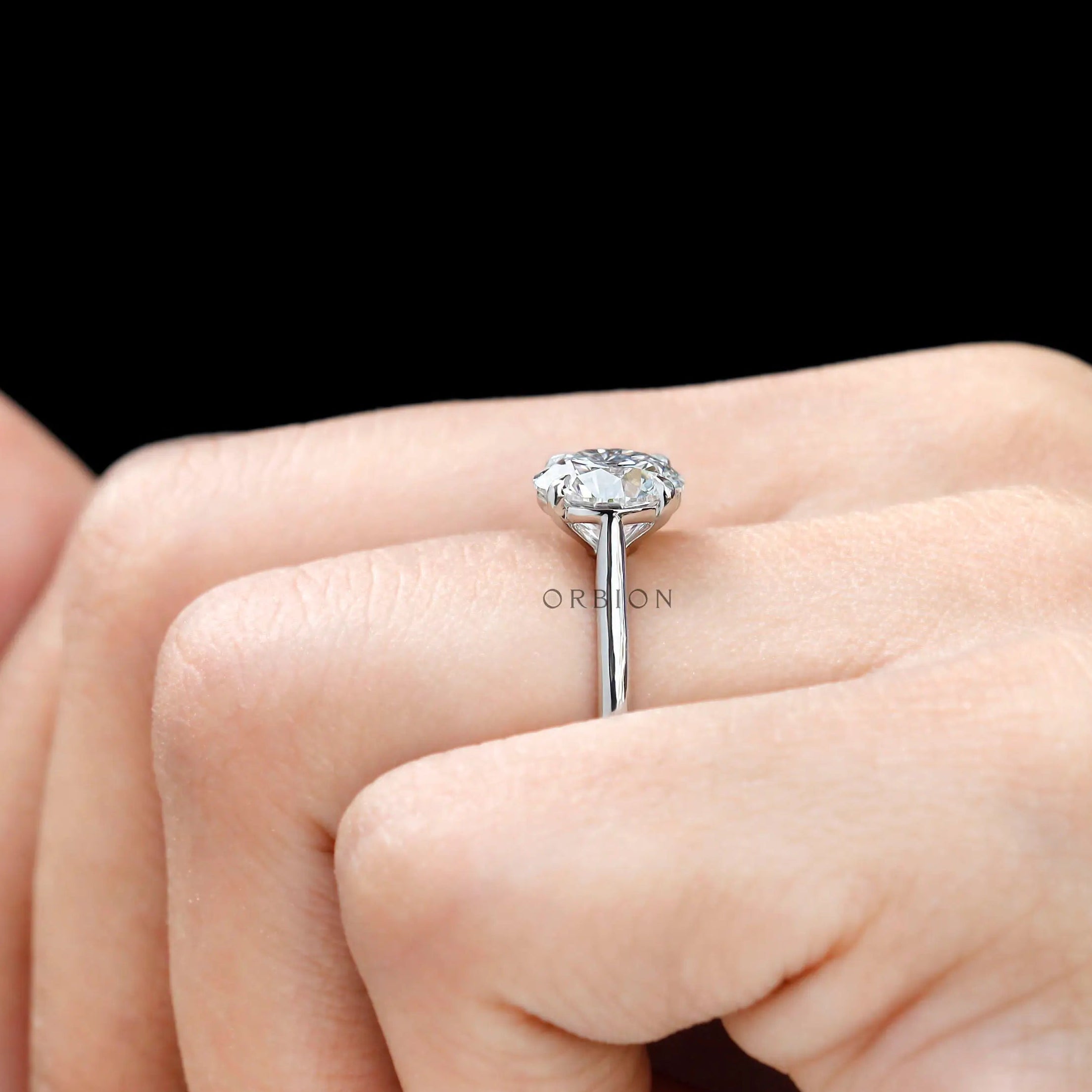 Elegant white gold solitaire engagement ring minimal design
