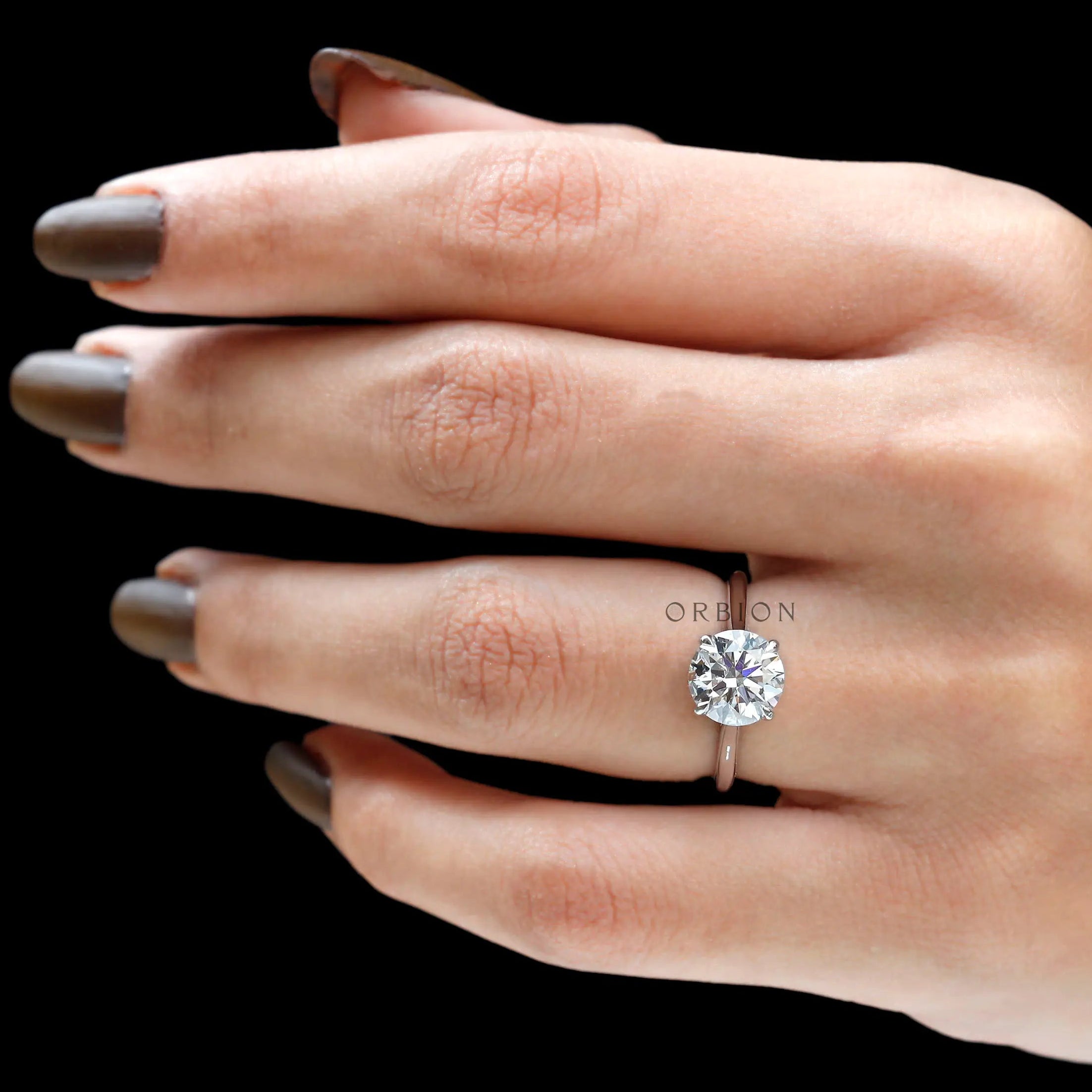 White gold cathedral engagement ring