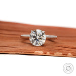 Brilliant cut round lab diamond solitaire ring white gold close up