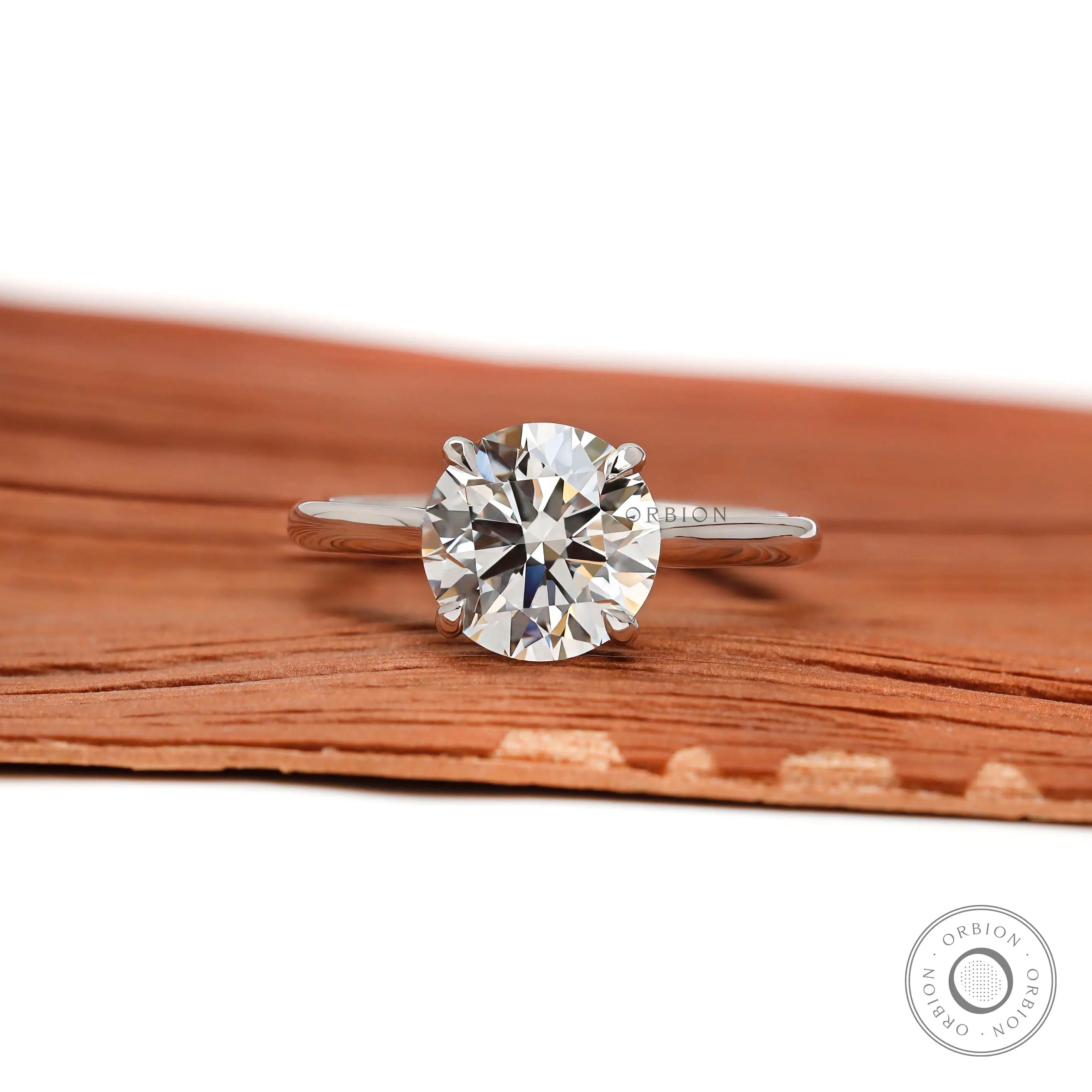 Brilliant cut round lab diamond solitaire ring white gold close up