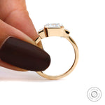 Side view of 3 stone emerald cut moissanite ring