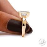 Side view of thick tapered band in yellow gold