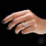 Elegant 3 carat solitaire oval ring worn on hand lifestyle view