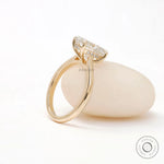 Cathedral setting hidden halo oval diamond ring