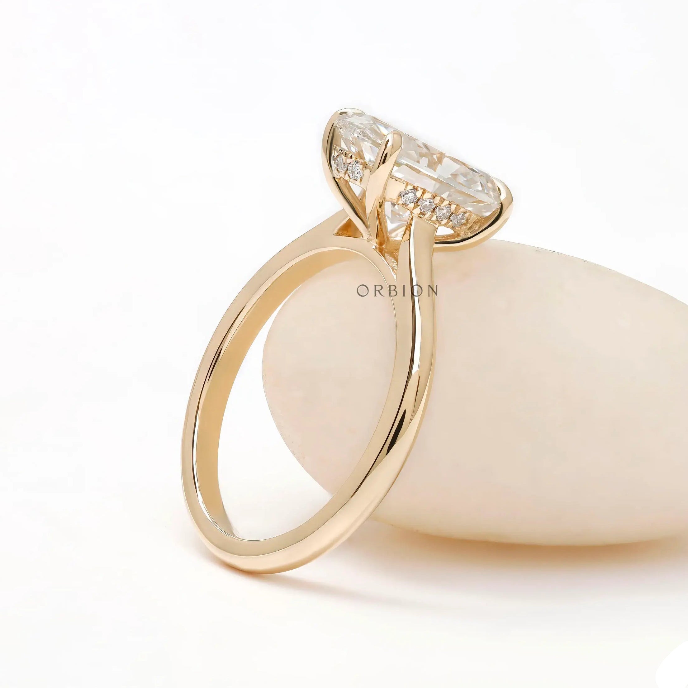 Cathedral setting hidden halo oval diamond ring