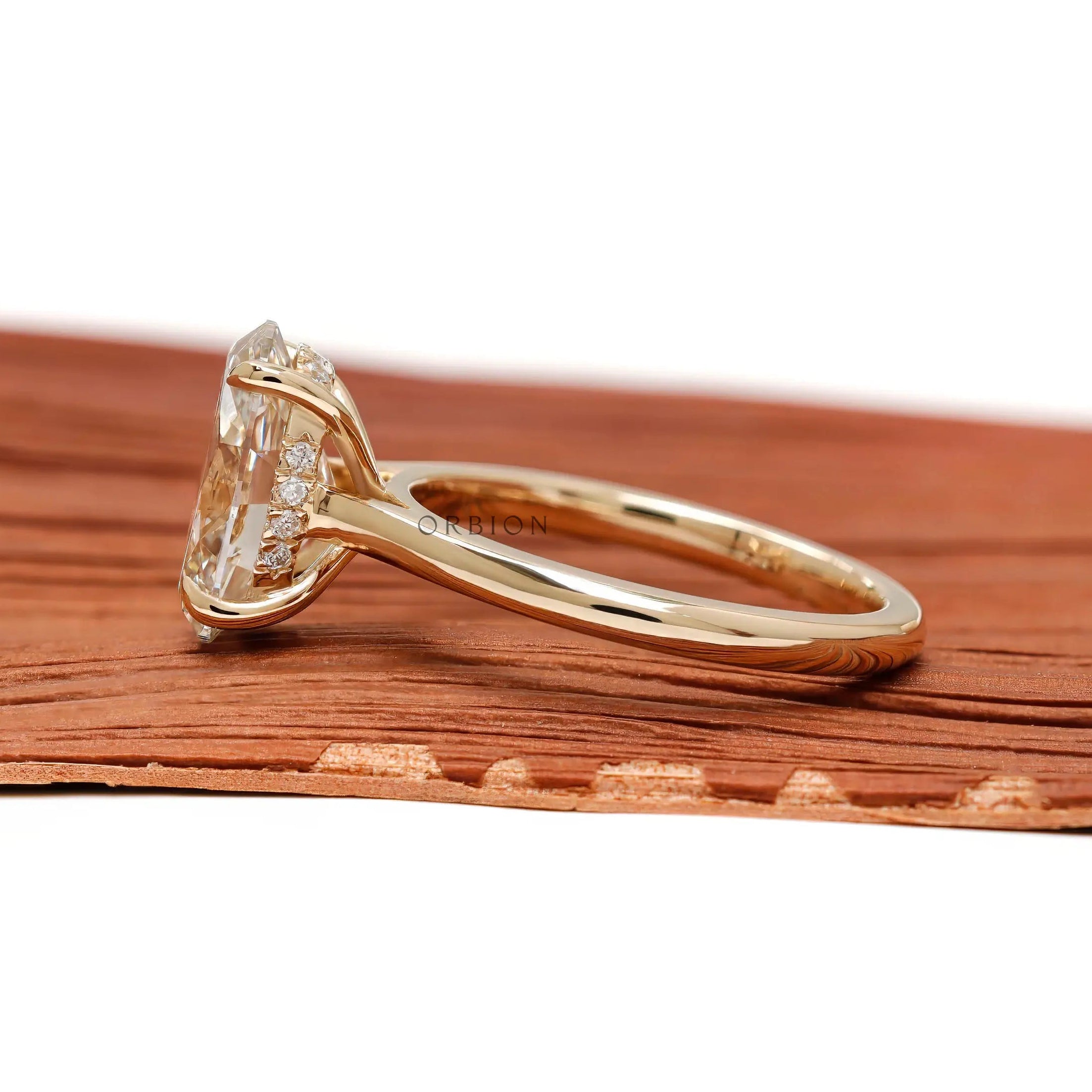 side view showing hidden halo beneath center stone