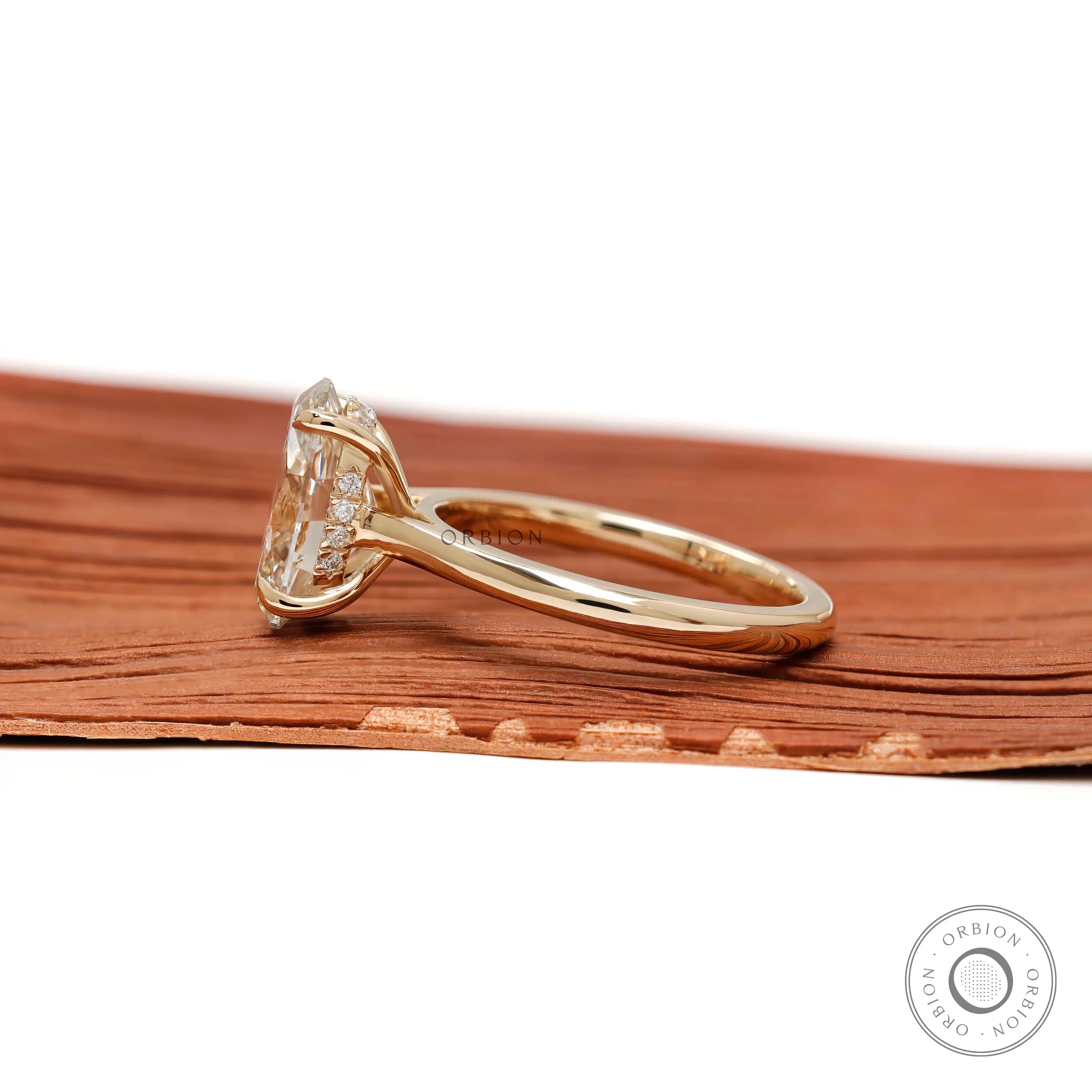 side view showing hidden halo beneath center stone