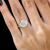 Three stone moissanite ring with step cut trapezoid accents on finger