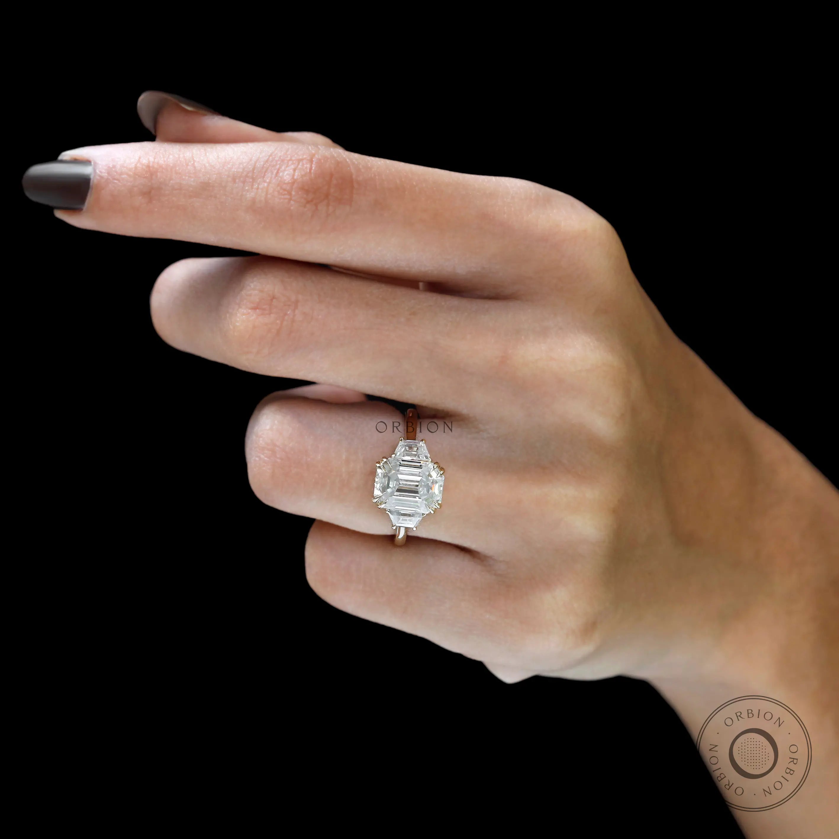 three stone emerald trilogy ring glossy finish 