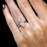 Large marquise diamond ring on hand