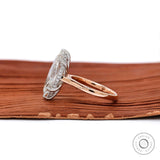Two tone gold engagement ring with slim glossy band