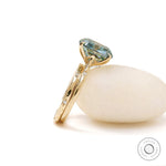 Celestial band ring set with elongated cushion blue green moissanite