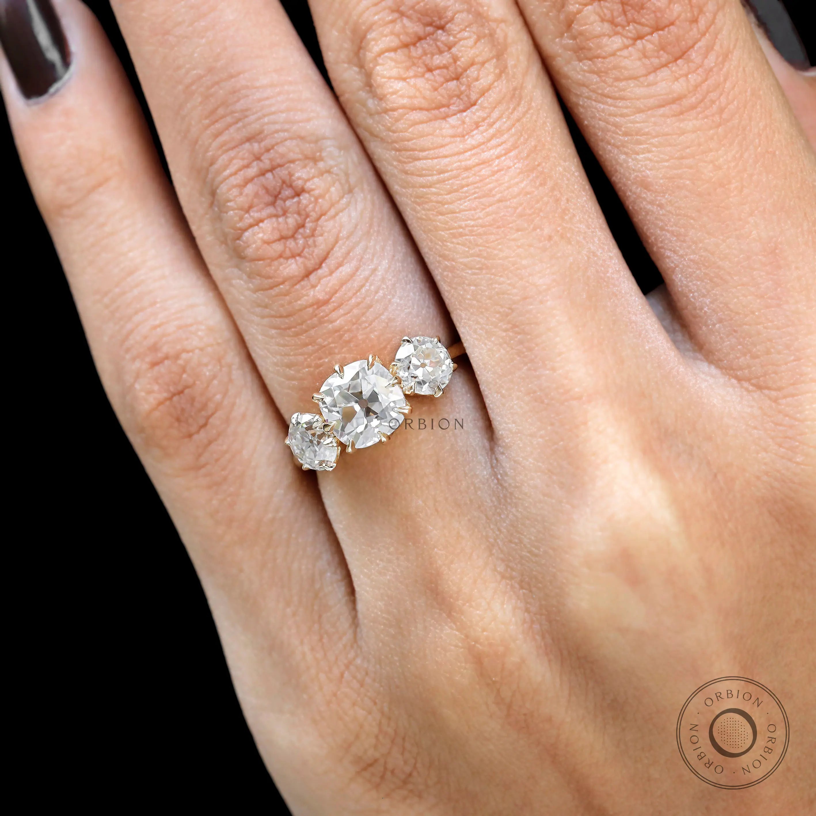 Lab diamond cushion trilogy engagement ring