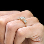 Classic three stone Old Mine cut engagement ring