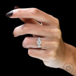 Cushion lab diamond ring with symmetrical round side stones