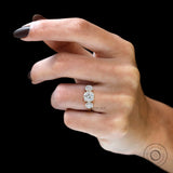 Cushion lab diamond ring with symmetrical round side stones