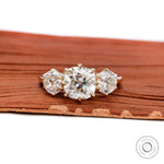 Vintage cushion Old Mine cut three stone engagement ring in 14K yellow gold