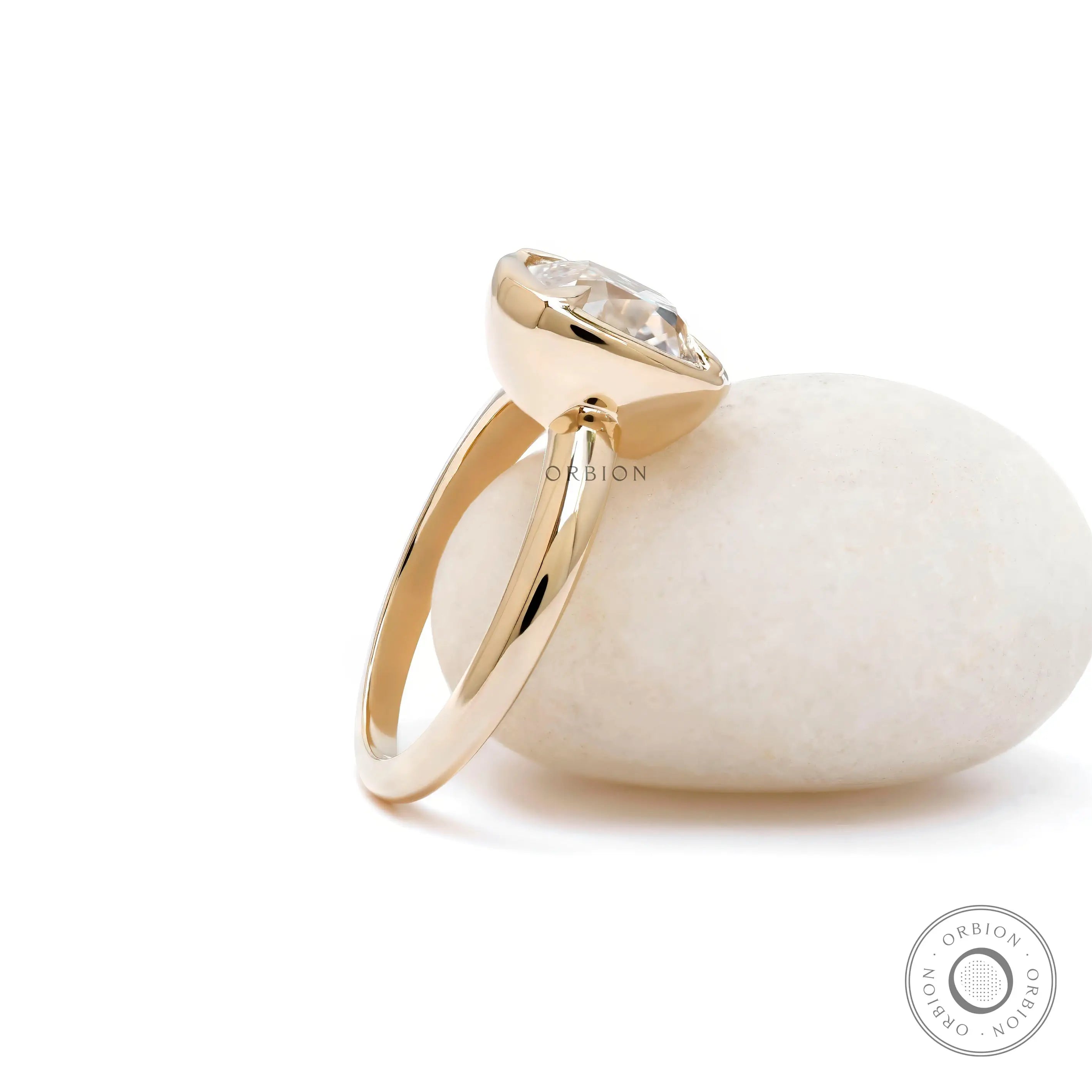 Antique inspired yellow gold cushion engagement ring close up