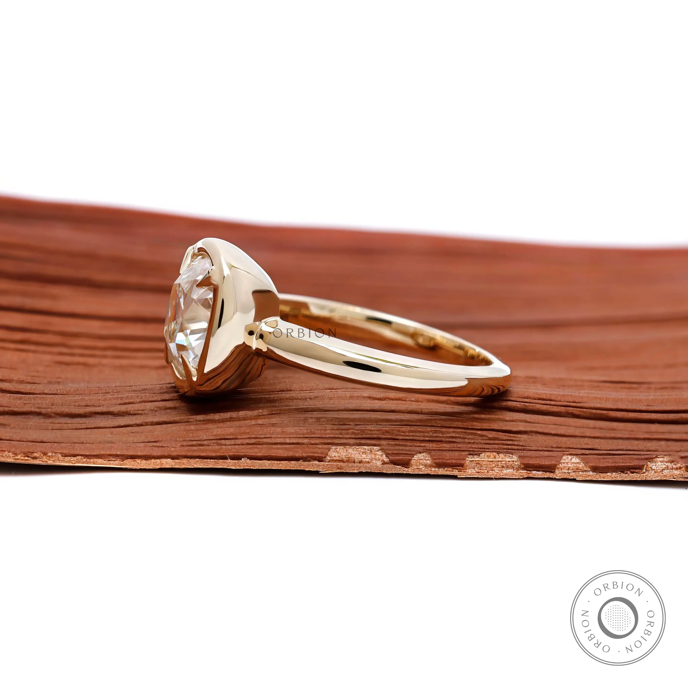 Old mine cut cushion solitaire ring glossy gold