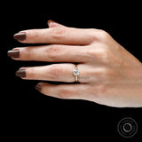 Timeless old mine cut engagement ring on finger