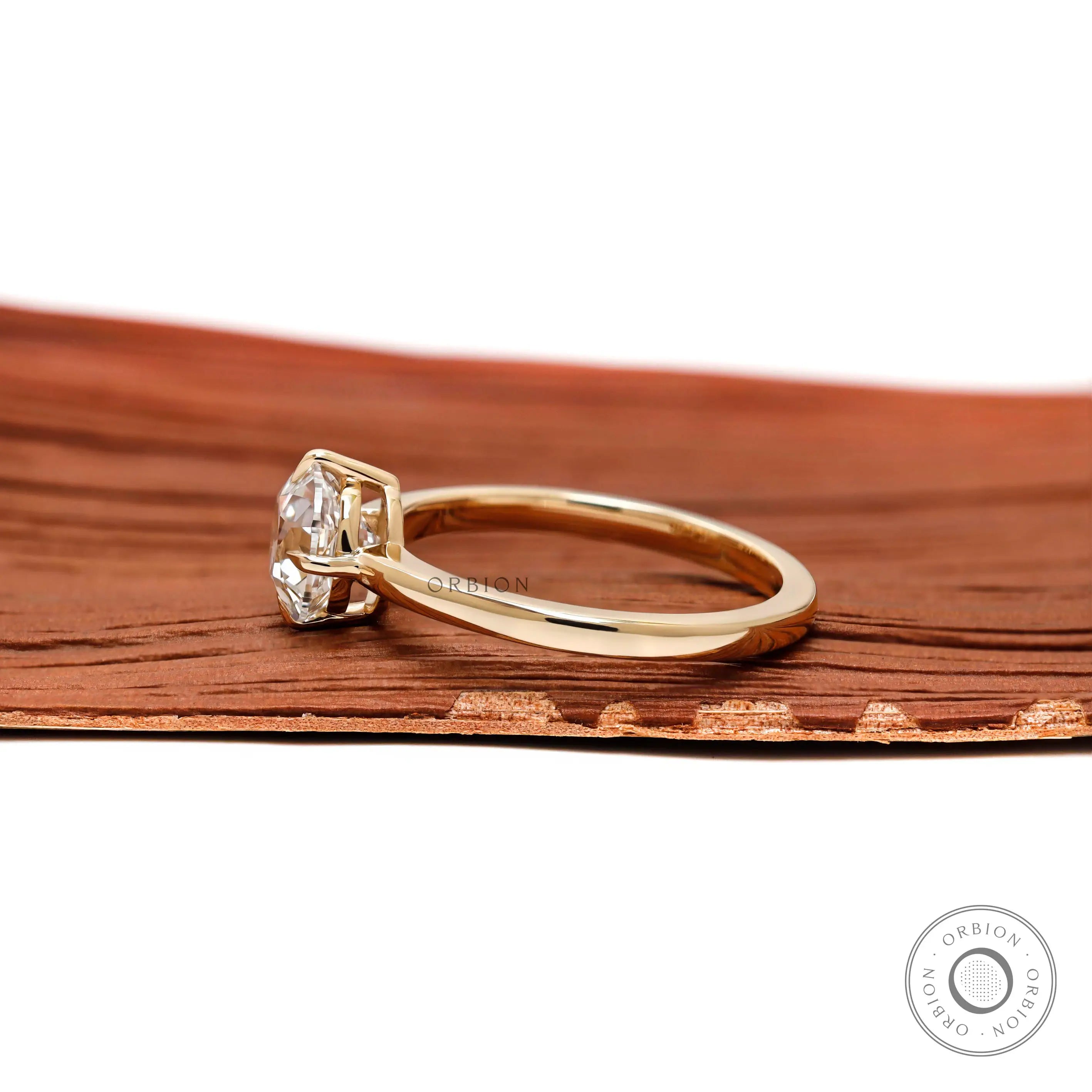 Vintage inspired cushion cut engagement ring glossy gold band