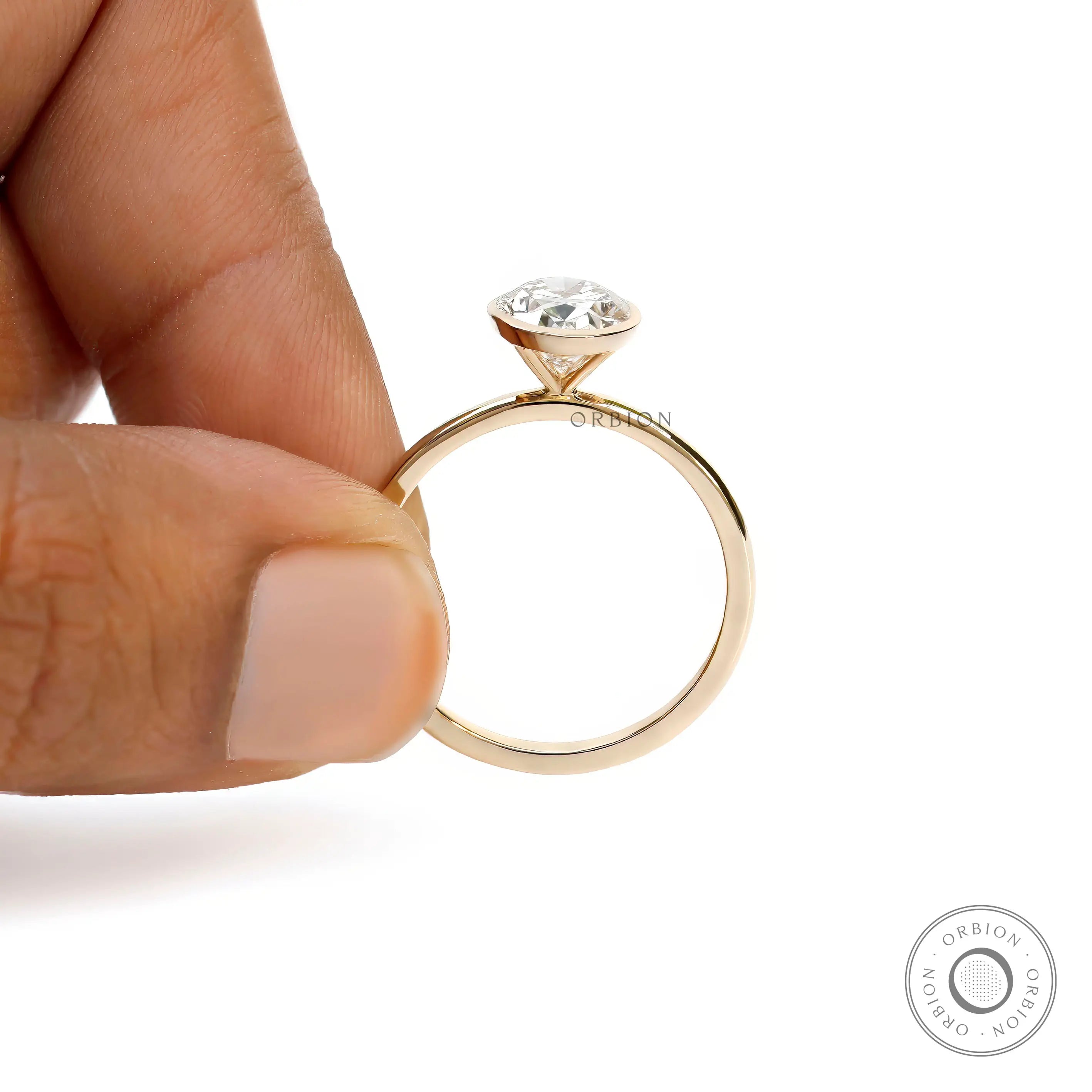 Contemporary oval bezel engagement ring thin gold band  