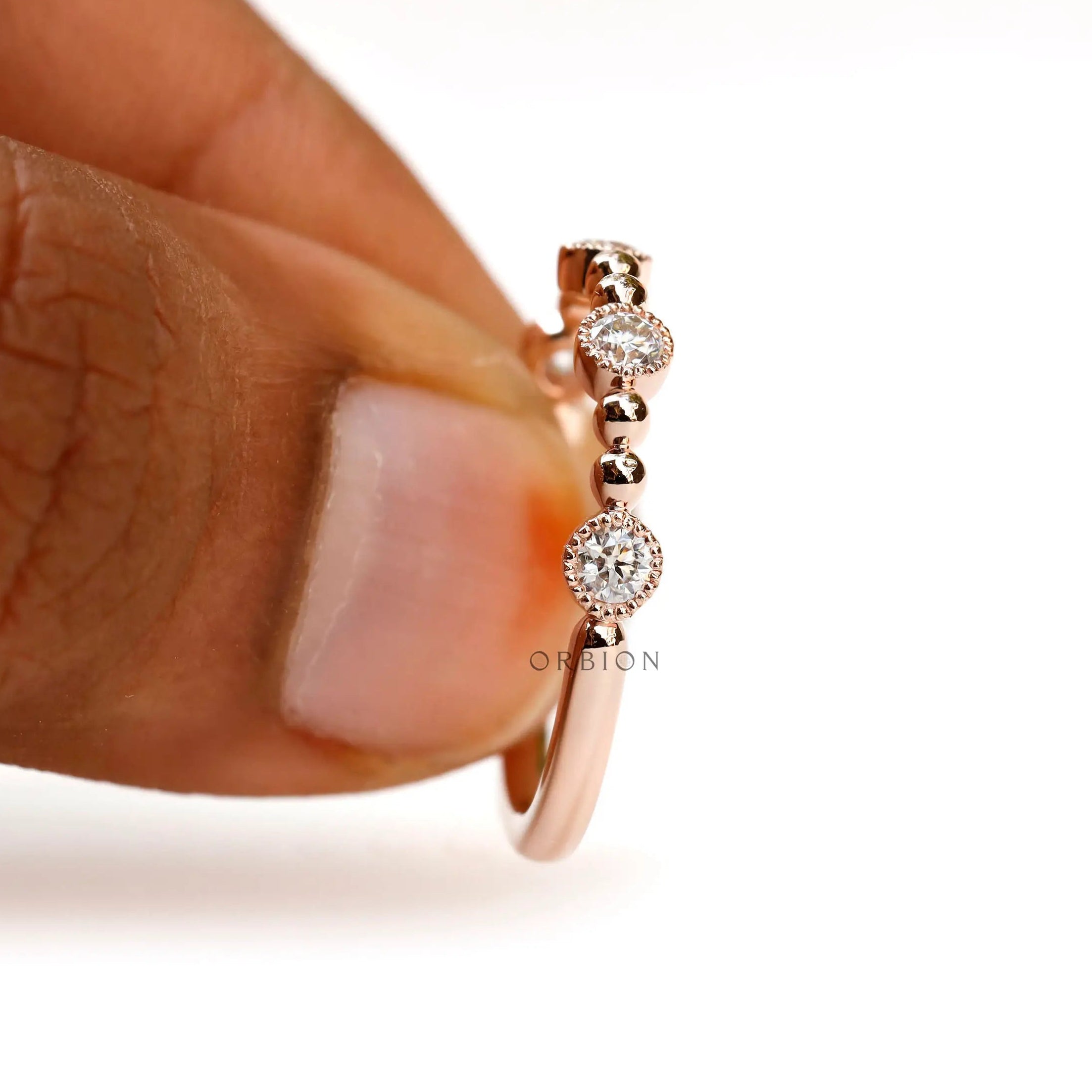 Minimalist half eternity lab diamond band with glossy rose gold finish  