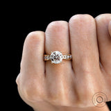 Fine jewelry round engagement ring with polished gold band