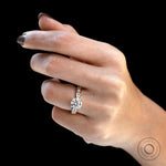 Classic four prong round solitaire ring glossy finish