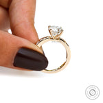 Luxury 18k gold solitaire ring with accent stones