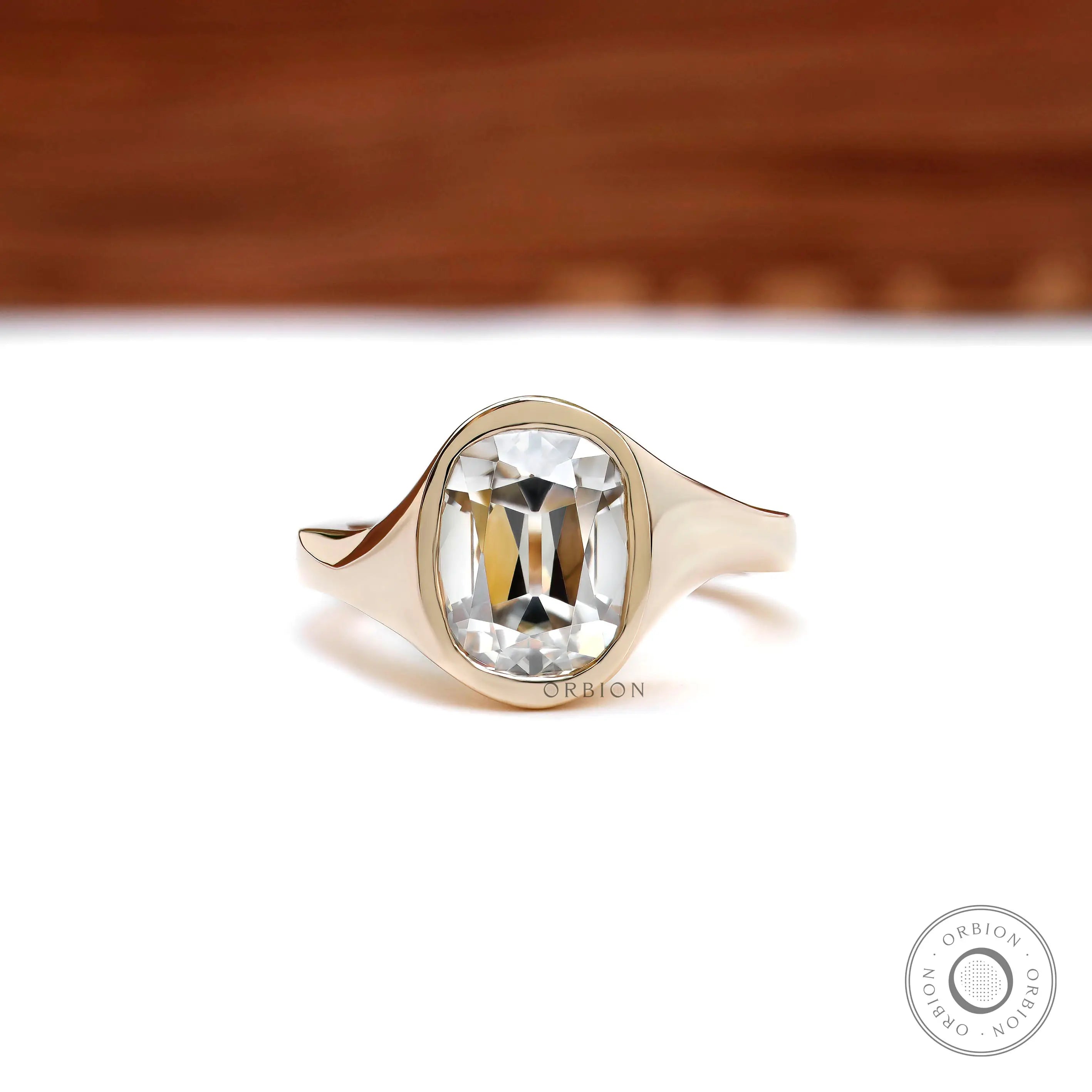 Old mine cut elongated cushion bezel engagement ring in 14k yellow gold  
