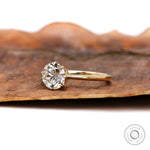 Antique inspired yellow gold solitaire engagement ring