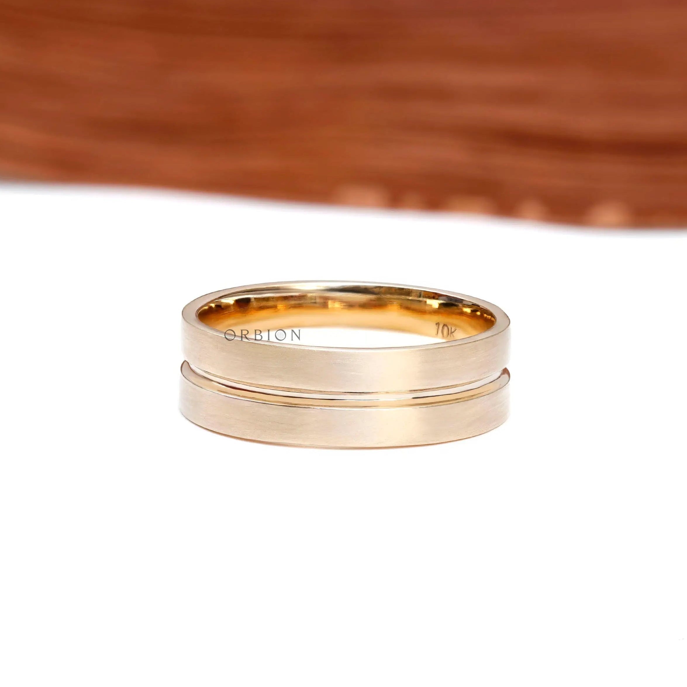 10K yellow gold 7mm wide men’s wedding band with satin finish front view