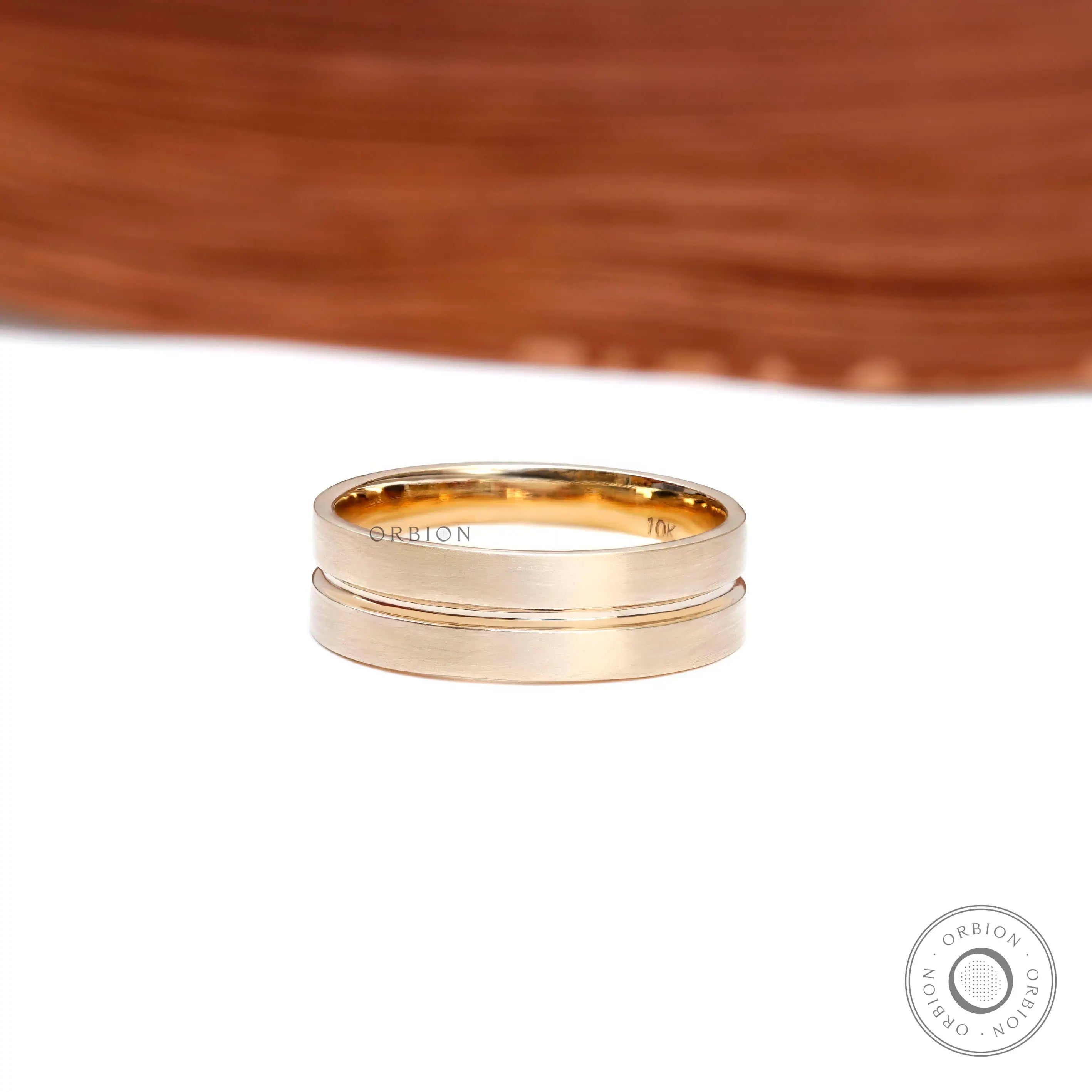 10K yellow gold 7mm wide men’s wedding band with satin finish front view