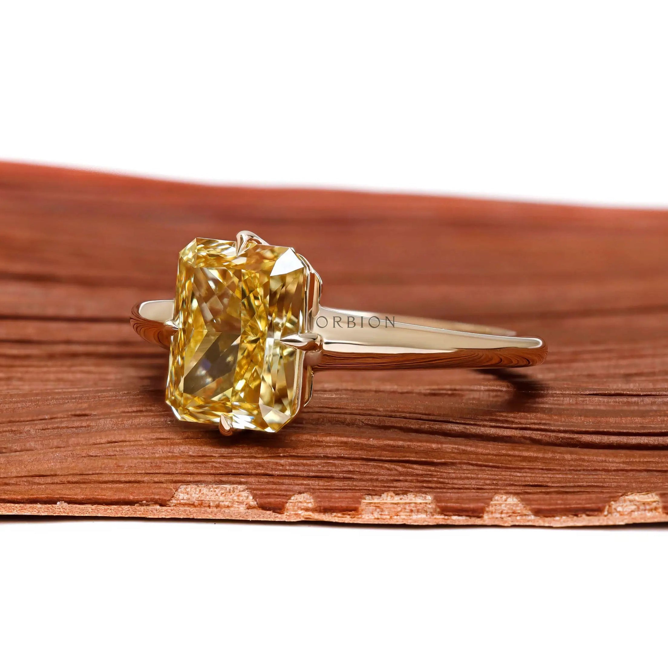 Fancy yellow radiant lab diamond solitaire ring