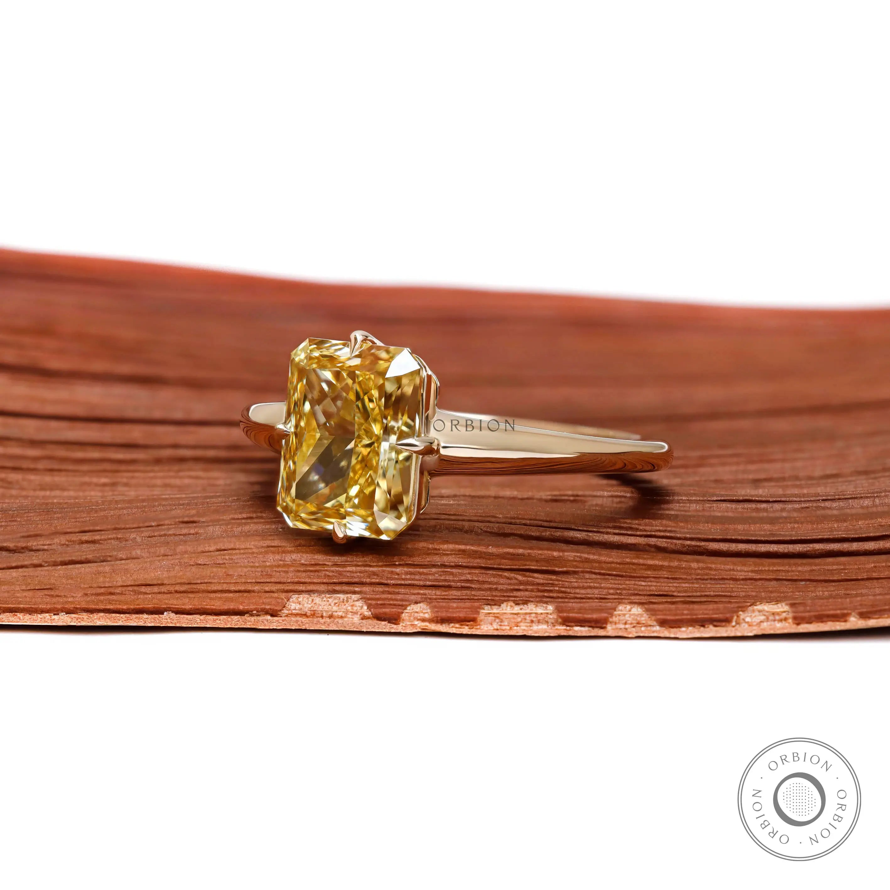 Fancy yellow radiant lab diamond solitaire ring