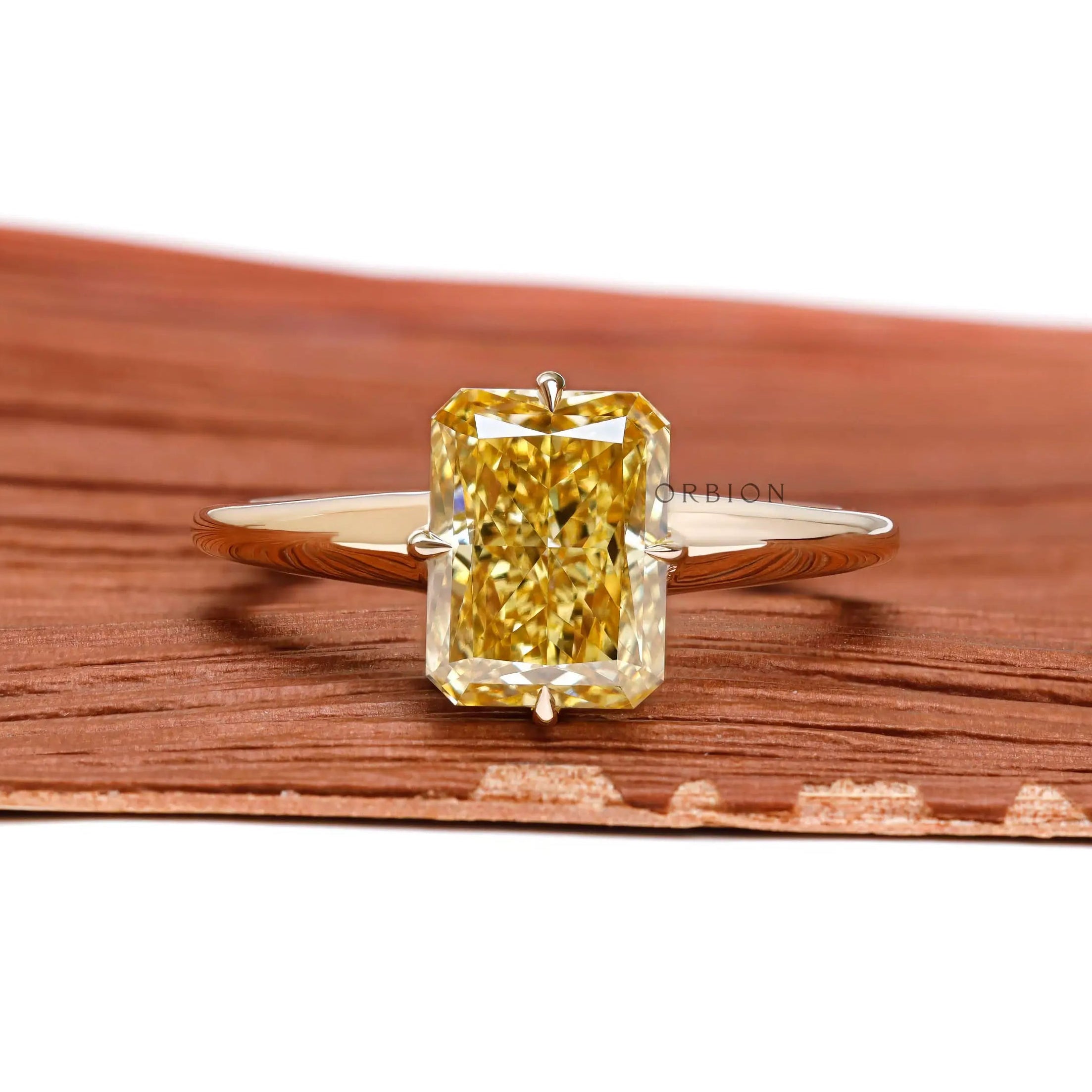Fancy yellow crushed ice radiant cut lab diamond ring in 14k yellow gold