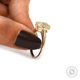 Radiant cut yellow diamond solitaire ring