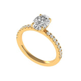Oval brilliant cut engagement ring with side diamonds